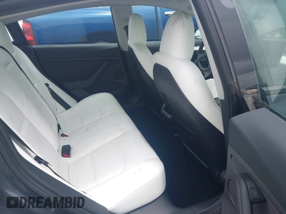 2023 Tesla Model 3 with VIN 5YJ3E1EAXPF628911, listed as a IAAI auction lot 42362410 with 25,387 mi miles and . Bid and sale history available at DreamBid. Image 8.