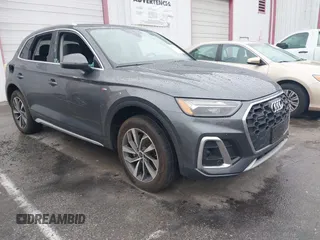 2023 Audi Q5 S line Premium Plus z VIN WA1EAAFY7P2178566, wystawiony jako IAAI lot #41734994 z przebiegiem Nie podano mil oraz . Historia ofert i sprzedaży dostępna na DreamBid. Obrazek 1.