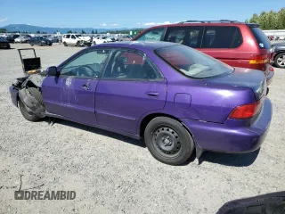 1996 Acura Integra LS with VIN JH4DB7653TS005093, listed as a Copart auction lot 57783383 with 217,250 mi miles and Salvage title. Bid and sale history available at DreamBid. Image 2.