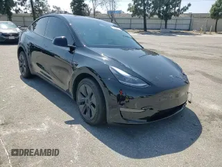 2024 Tesla Model Y z VIN 7SAYGDED8RF123516, wystawiony jako Copart lot #55354655 z przebiegiem 12 521 mil mil oraz Szkoda całkowita • Salvage title. Historia ofert i sprzedaży dostępna na DreamBid. Obrazek 14.