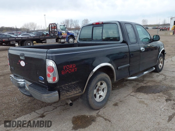 1997 Ford F-150 with VIN 2FTDX1720VCA73590, listed as a IAAI auction lot 41956713 with 128,220 mi miles and . Bid and sale history available at DreamBid. Image 4.