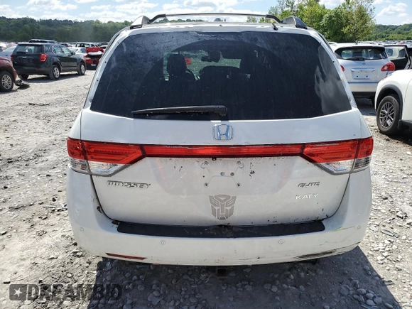 2014 Honda Odyssey Touring with VIN 5FNRL5H98EB053486, listed as a Copart auction lot 58004225 with 201,526 mi miles and Salvage title. Bid and sale history available at DreamBid. Image 6.