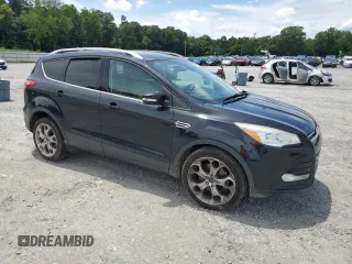 2014 Ford Escape Titanium с VIN 1FMCU0J9XEUA27152, выставлен на аукционе Copart как лот 60246715 с пробегом 182 550 миль миль и Чистый • Clean title. История ставок и продаж доступна на DreamBid. Изображение 4.