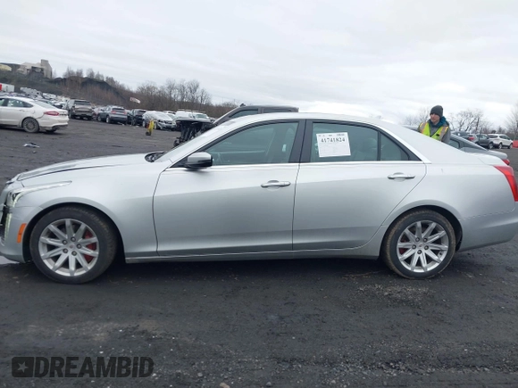 2014 Cadillac CTS Luxury AWD z VIN 1G6AX5SX3E0194895, wystawiony jako IAAI lot #41741824 z przebiegiem 197 042 mil mil oraz . Historia ofert i sprzedaży dostępna na DreamBid. Obrazek 14.
