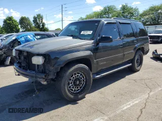 2000 GMC Denali with VIN 1GKEK13R4YR150964, listed as a Copart auction lot 80484214 with 176,859 mi miles and Salvage Title. Bid and sale history available at carsss.com. Image 1.