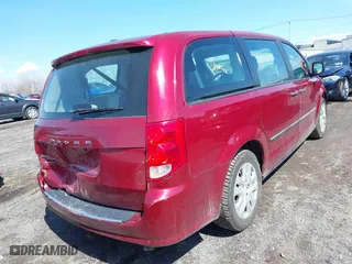 2014 Dodge Grand Caravan SE with VIN 2C4RDGBG8ER130488, listed as a IAAI auction lot 41974981 with 126,315 mi miles. Bid and sale history available at carsss.com. Image 4.