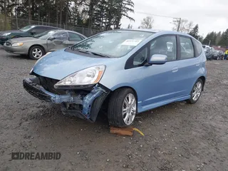 2009 Honda Fit Sport w/Navi with VIN JHMGE886X9S042490, listed as a IAAI auction lot 41931712 with 111,088 mi miles. Bid and sale history available at carsss.com. Image 2.