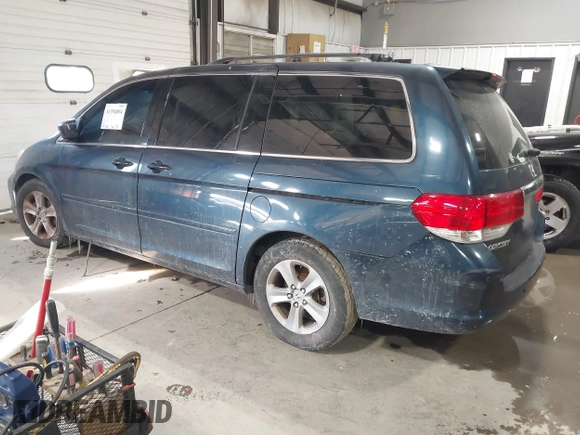 2010 Honda Odyssey Touring with VIN 5FNRL3H98AB095042, listed as a IAAI auction lot 41394894 with 254,525 mi miles. Bid and sale history available at carsss.com. Image 3.