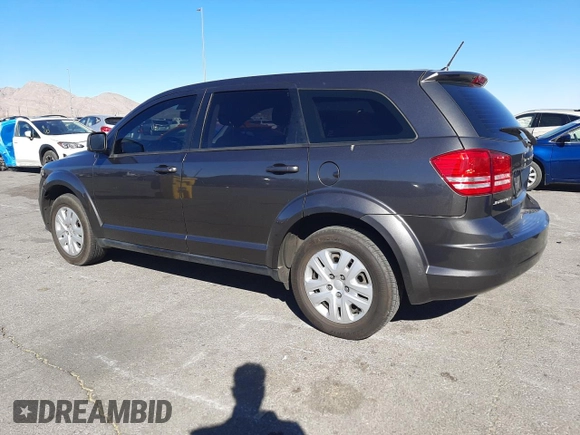 2014 Dodge Journey American Value Pkg with VIN 3C4PDCAB8ET303350, listed as a Copart auction lot 44808995 with 124,435 mi miles and Salvage Title. Bid and sale history available at carsss.com. Image 2.