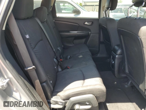 2017 Dodge Journey SXT z VIN 3C4PDCBG7HT547666, wystawiony jako Copart lot #57987875 z przebiegiem 124 484 mil mil oraz Szkoda całkowita • Salvage title. Historia ofert i sprzedaży dostępna na DreamBid. Obrazek 11.