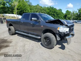 2019 Ram 2500 Big Horn with VIN 3C6UR5JLXKG606957, listed as a Copart auction lot 57713014 with 102,399 mi miles and Salvage Title. Bid and sale history available at carsss.com. Image 4.