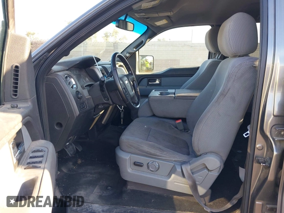 2014 Ford F-150 XL z VIN 1FTFW1CT0EFB69945, wystawiony jako IAAI lot #42507421 z przebiegiem 141 167 mil mil oraz . Historia ofert i sprzedaży dostępna na DreamBid. Obrazek 5.
