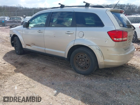 2014 Dodge Journey SE with VIN 3C4PDCAB2ET166065, listed as a IAAI auction lot 42137057 with 194,775 mi miles. Bid and sale history available at carsss.com. Image 3.