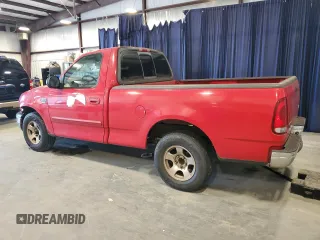 2003 Ford F-150 XL with VIN 1FTRF17W03NB26338, listed as a Copart auction lot 82484904 with 163,992 mi miles and Salvage Title. Bid and sale history available at DreamBid. Image 2.