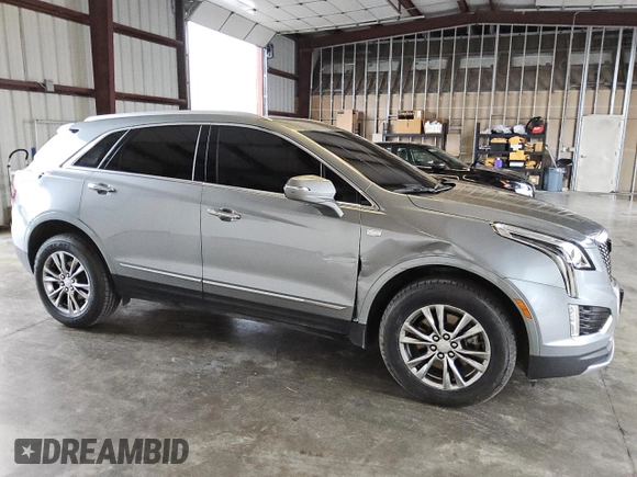 2023 Cadillac XT5 AWD Premium Luxury with VIN 1GYKNDR49PZ222592, listed as a Copart auction lot 79759624 with 32,177 mi miles and Clean Title. Bid and sale history available at DreamBid. Image 4.