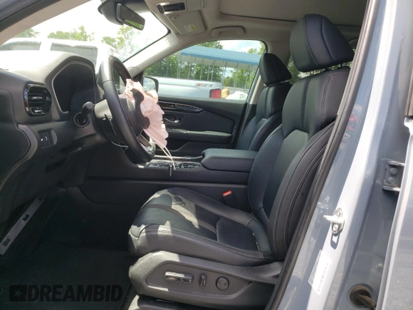2023 Honda Pilot Touring with VIN 5FNYG2H78PB006054, listed as a Copart auction lot 56039785 with 35,831 mi miles and Salvage title. Bid and sale history available at DreamBid. Image 7.