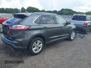 2020 Ford Edge SEL z VIN 2FMPK4J98LBA29600, wystawiony jako IAAI lot #42547635 z przebiegiem 82 222 mil mil oraz . Historia ofert i sprzedaży dostępna na DreamBid. Obrazek 4.