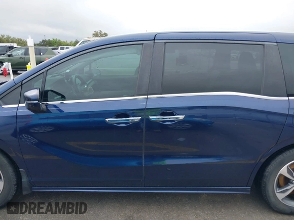 2018 Honda Odyssey Touring with VIN 5FNRL6H85JB001501, listed as a IAAI auction lot 41911497 with 92,407 mi miles. Bid and sale history available at carsss.com. Image 14.