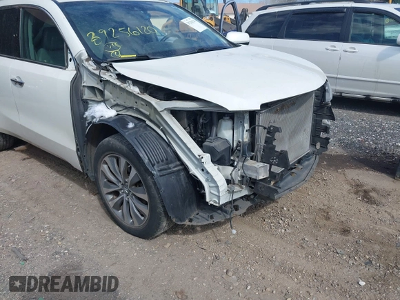2016 Acura MDX w/Tech with VIN 5FRYD4H43GB014801, listed as a IAAI auction lot 39256120 with 73,769 mi miles. Bid and sale history available at carsss.com. Image 6.