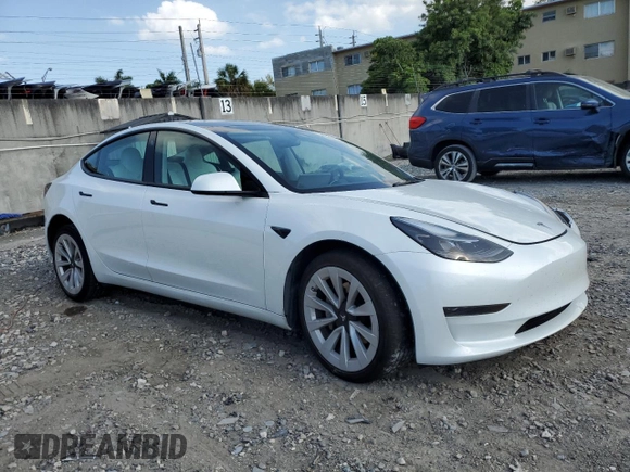 2023 Tesla Model 3 z VIN 5YJ3E1EAXPF422956, wystawiony jako Copart lot #52500285 z przebiegiem 24 082 mil mil oraz Nie do naprawy • Non repairable. Historia ofert i sprzedaży dostępna na DreamBid. Obrazek 4.