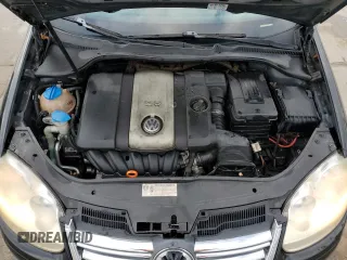 2009 Volkswagen Jetta SE z VIN 3VWRZ71KX9M140425, wystawiony jako Copart lot #85962374 z przebiegiem 177 732 mil mil oraz Szkoda całkowita • Salvage title. Historia ofert i sprzedaży dostępna na DreamBid. Obrazek 11.