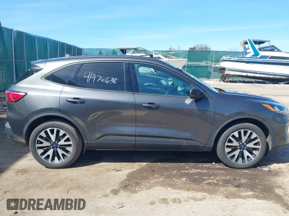 2020 Ford Escape SE Sport Hybrid with VIN 1FMCU9BZ0LUB81689, listed as a IAAI auction lot 41978638 with 69,831 mi miles and . Bid and sale history available at DreamBid. Image 13.