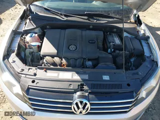 2012 Volkswagen Passat S w/Appearance with VIN 1VWAH7A34CC106918, listed as a IAAI auction lot 41351509 with 202,208 mi miles. Bid and sale history available at carsss.com. Image 10.