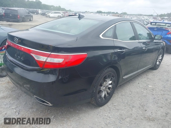 2013 Hyundai Azera with VIN KMHFH4JG4DA243182, listed as a IAAI auction lot 42403300 with 237,975 mi miles and . Bid and sale history available at DreamBid. Image 4.