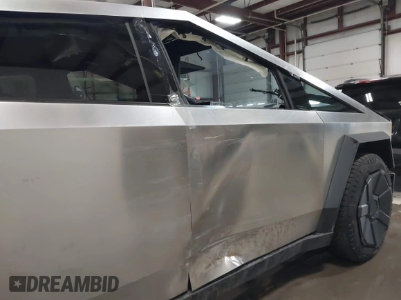 2024 Tesla Cybertruck with VIN 7G2CEHED0RA009086, listed as a IAAI auction lot 41855548 with 15,507 mi miles. Bid and sale history available at carsss.com. Image 20.