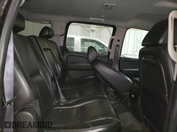 2013 Chevrolet Suburban with VIN 1GNWK5EG4DR246825, listed as a Copart auction lot 56764205 with 162,459 mi miles and Salvage title. Bid and sale history available at DreamBid. Image 11.