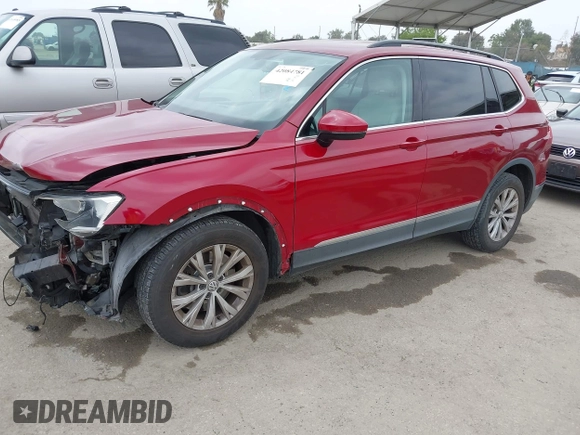 2018 Volkswagen Tiguan SEL with VIN 3VV3B7AX9JM031453, listed as a IAAI auction lot 42084781 with 82,931 mi miles and . Bid and sale history available at DreamBid. Image 2.