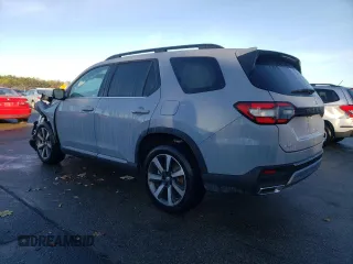 2024 Honda Pilot Touring with VIN 5FNYG1H72RB006807, listed as a Copart auction lot 77688243 with 1,331 mi miles and Salvage Title. Bid and sale history available at carsss.com. Image 2.