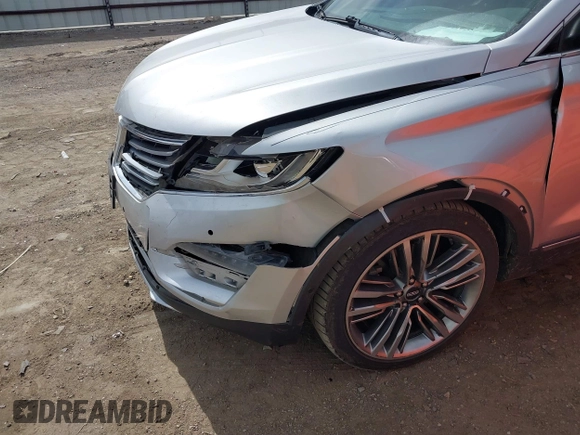 2015 Lincoln MKC with VIN 5LMTJ2AH8FUJ23341, listed as a IAAI auction lot 41828159 with 103,562 mi miles. Bid and sale history available at carsss.com. Image 12.