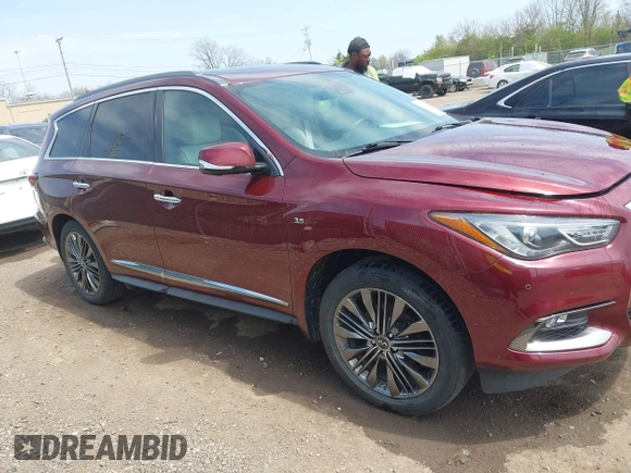 2019 Infiniti QX60 Luxe with VIN 5N1DL0MM5KC515014, listed as a IAAI auction lot 42073879 with 100,566 mi miles and . Bid and sale history available at DreamBid. Image 13.