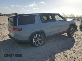 2025 Rivian R1S Adventure z VIN 7PDSGBBA5SN045424, wystawiony jako Copart lot #49675655 z przebiegiem Nie podano mil oraz Szkoda całkowita • Salvage title. Historia ofert i sprzedaży dostępna na DreamBid. Obrazek 3.