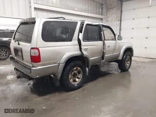 1998 Toyota 4Runner Limited with VIN JT3HN87R0W0189219, listed as a IAAI auction lot 41815288 with 227,784 mi miles. Bid and sale history available at carsss.com. Image 4.
