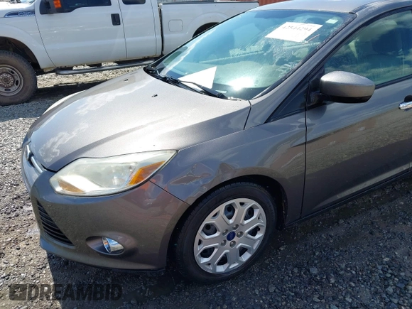 2012 Ford Focus SE with VIN 1FAHP3F27CL455865, listed as a IAAI auction lot 42544294 with 120,089 mi miles and . Bid and sale history available at DreamBid. Image 6.