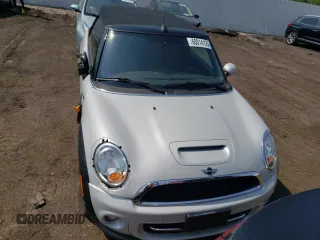 2014 MINI Convertible z VIN WMWZN3C55ET861050, wystawiony jako Copart lot #60014125 z przebiegiem 101 524 mil mil oraz Czysty tytuł • Clean title. Historia ofert i sprzedaży dostępna na DreamBid. Obrazek 5.