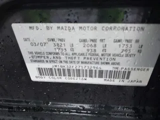 2007 Mazda 3 i Sport with VIN JM1BK32F271732964, listed as a IAAI auction lot 41865745 with 124,846 mi miles and . Bid and sale history available at carsss.com. Image 9.
