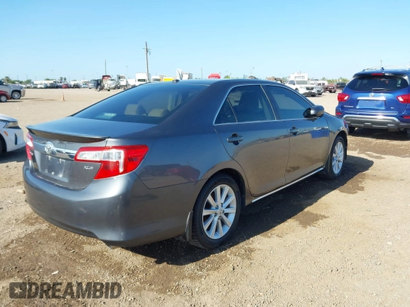 2014 Toyota Camry L with VIN 4T1BF1FK4EU733637, listed as a IAAI auction lot 41979947 with 120,060 mi miles. Bid and sale history available at carsss.com. Image 4.