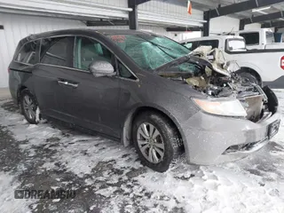 2016 Honda Odyssey SE with VIN 5FNRL5H32GB155946, listed as a IAAI auction lot 41590237 with 140,167 mi miles. Bid and sale history available at carsss.com. Image 1.