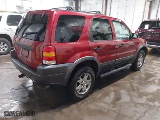 2003 Ford Escape XLT Popular 2 with VIN 1FMCU93173KA52806, listed as a IAAI auction lot 41696250 with 138,338 mi miles. Bid and sale history available at carsss.com. Image 4.