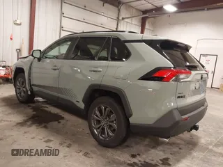 2023 Toyota RAV4 Hybrid XLE Premium z VIN 4T3B6RFV0PU118506, wystawiony jako IAAI lot #41972785 z przebiegiem 16 496 mil mil oraz . Historia ofert i sprzedaży dostępna na DreamBid. Obrazek 3.