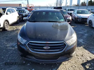 2014 Ford Taurus Limited z VIN 1FAHP2J8XEG170806, wystawiony jako Copart lot #84871394 z przebiegiem 170 124 mil mil oraz Czysty tytuł • Clean title. Historia ofert i sprzedaży dostępna na DreamBid. Obrazek 5.