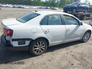 2010 Volkswagen Jetta Limited Edition with VIN 3VWRZ7AJ7AM058938, listed as a IAAI auction lot 42348838 with 102,482 mi miles and . Bid and sale history available at DreamBid. Image 6.