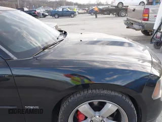 2006 Dodge Charger SRT-8 with VIN 2B3LA73W96H371246, listed as a IAAI auction lot 41676168 with 130,064 mi miles and . Bid and sale history available at carsss.com. Image 18.