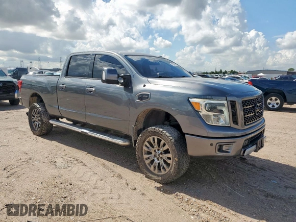 2016 Nissan Titan Platinum Reserve with VIN 1N6BA1F49GN503106, listed as a Copart auction lot 62740215 with 155,659 mi miles and Clean title. Bid and sale history available at DreamBid. Image 4.