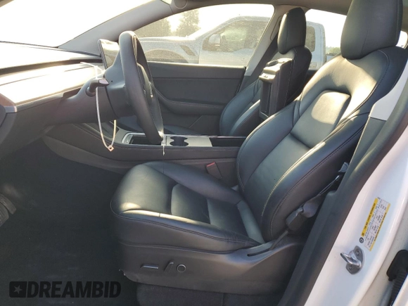 2022 Tesla Model Y Long Range with VIN 7SAYGAEE7NF376795, listed as a Copart auction lot 55113135 with 66,796 mi miles and Salvage Title. Bid and sale history available at carsss.com. Image 7.