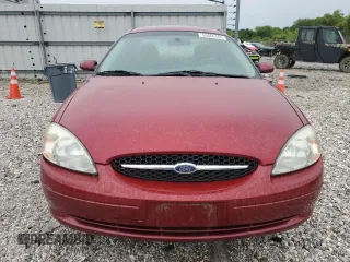 2002 Ford Taurus SE Standard z VIN 1FAFP53U22A220891, wystawiony jako Copart lot #55665405 z przebiegiem 131 530 mil mil oraz Szkoda całkowita • Salvage title. Historia ofert i sprzedaży dostępna na DreamBid. Obrazek 5.
