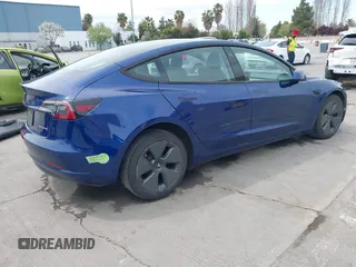 2021 Tesla Model 3 Long Range with VIN 5YJ3E1EB6MF878411, listed as a IAAI auction lot 41986947 with 71,978 mi miles and . Bid and sale history available at DreamBid. Image 4.